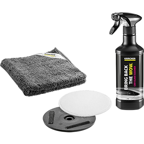 Kärcher autoruitreinigingsset: microvezeldoek, polijstpads en glazen reinigersprayfles met tekst.