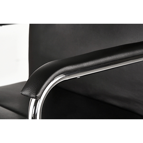 Close-up of a black leather armrest with a chrome metal frame.
