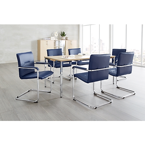 Conference room with table, six chairs with blue upholstery and a large window.