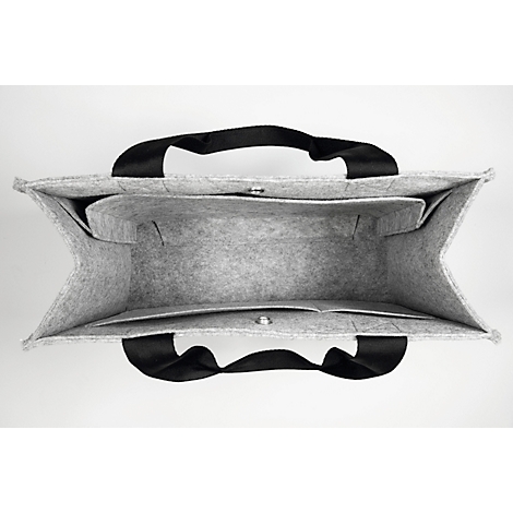 Sac en feutre gris clair avec poignées noires, vue de l'intérieur. Intérieur avec compartiments, fermetures magnétiques.