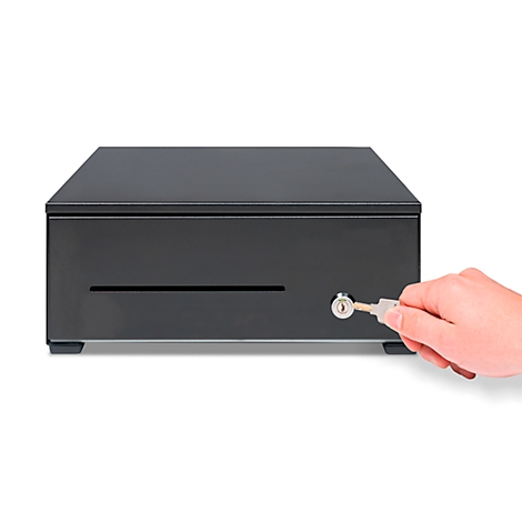 Black cash register with key. A hand holds the key to open the cash register. On a white background.