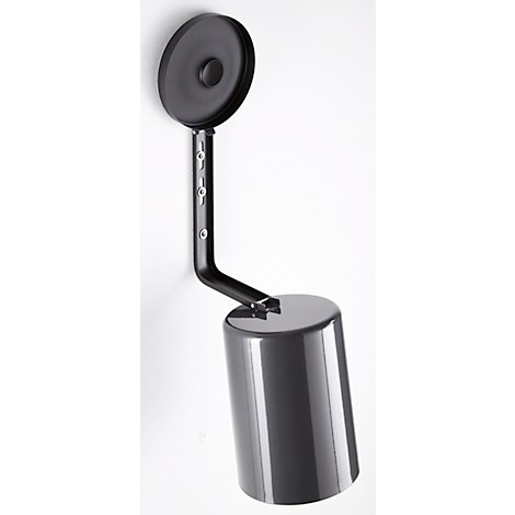 A wall lamp with a round head and cylindrical body, in anthracite, against a white wall.