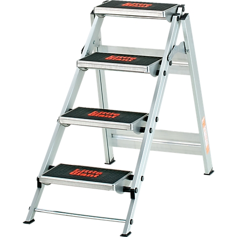 Foldable aluminum stepladder with four steps. Black treads with red "Little Giant" lettering. On a light background.