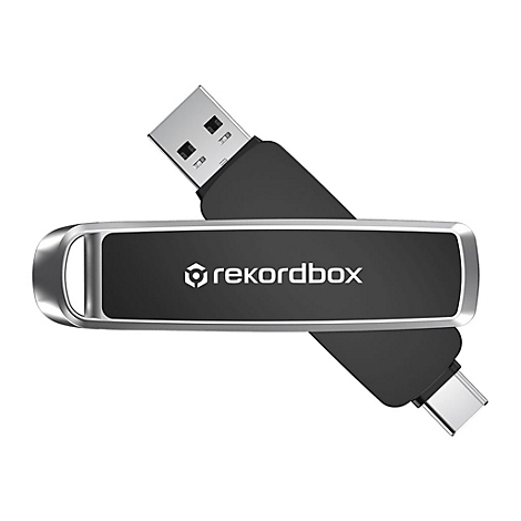 Schwarzer USB-Stick mit 'rekordbox' Logo und silbernen Akzenten. Stecker an beiden Enden erkennbar.