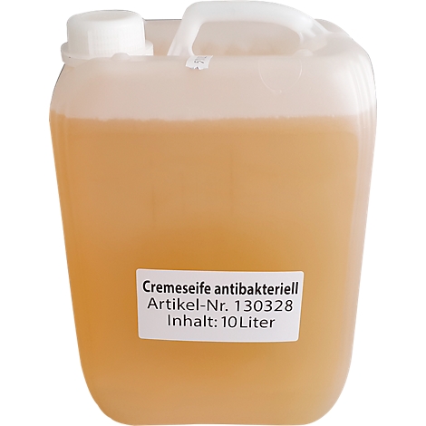 Savon crème beige dans un bidon en plastique rectangulaire avec poignée. Une étiquette affiche du texte.