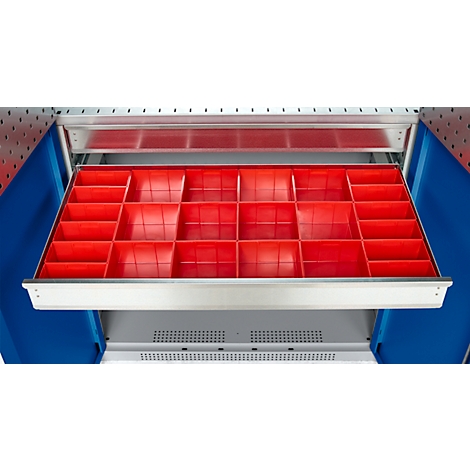 Tiroir ouvert d'une boîte à outils avec des compartiments rouges et carrés pour organiser les petites pièces.