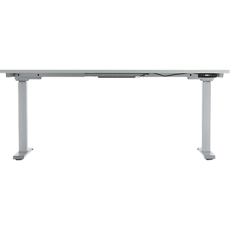 Un bureau blanc réglable en hauteur avec deux pieds. Il y a un panneau de contrôle à l'avant pour le réglage de la hauteur.
