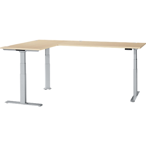 A corner desk with a light brown tabletop and silver, height-adjustable legs.