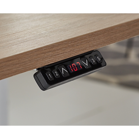 Close-up of the control panel of a height-adjustable desk, with a red digital display indicating the height in cm.