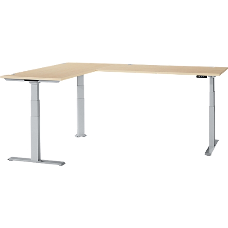 An L-shaped desk made of light wood with silver, height-adjustable legs. There is a control panel on the right side.