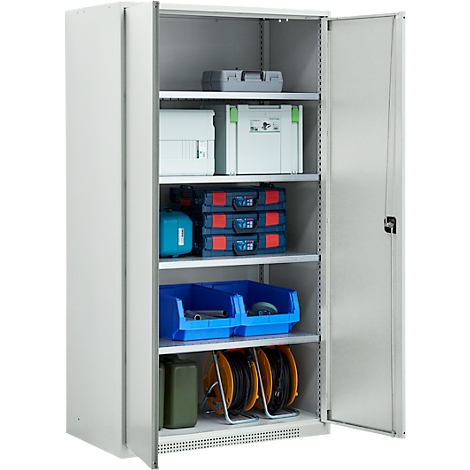 Armoire à outils ouverte avec outils et accessoires, remplie de boîtes, de tiroirs et de dévidoirs.