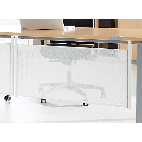 Desk with white lattice under the tabletop, office chair.