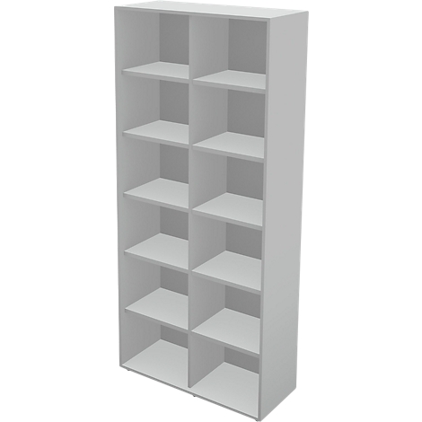 A white bookcase with multiple compartments divided by partitions. The bookcase is upright.