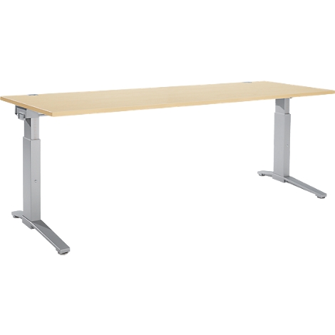 Beige verstelbare bureau. Grijze metalen poten, licht houten blad. Perspectiefbeeld, uitsnede.