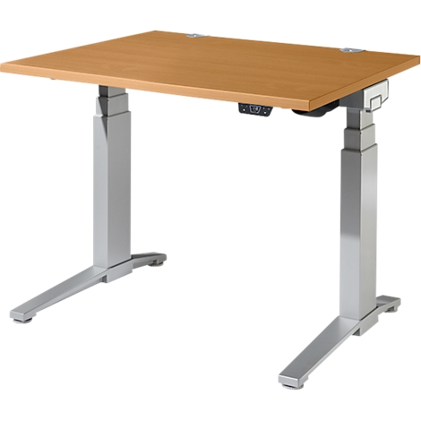 Un bureau réglable en hauteur avec plateau en bois et pieds argentés, panneau de commande sous le plateau.