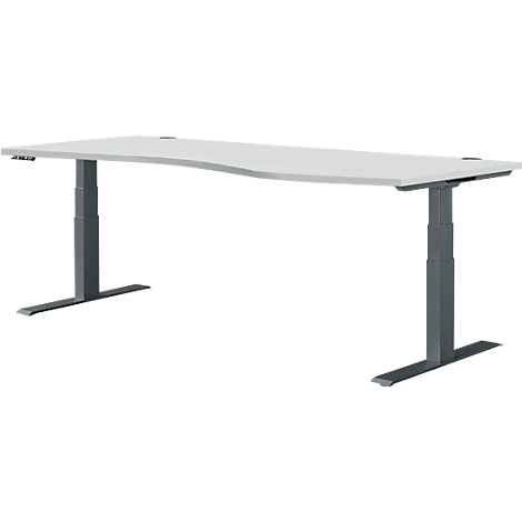 Un bureau blanc réglable en hauteur avec des pieds gris et un plateau incurvé. Le bureau est sur fond blanc.
