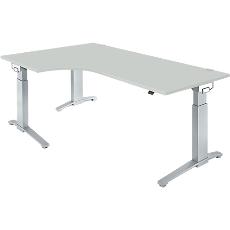A white, height-adjustable corner desk with silver legs. A control panel for height adjustment is visible on the tabletop.