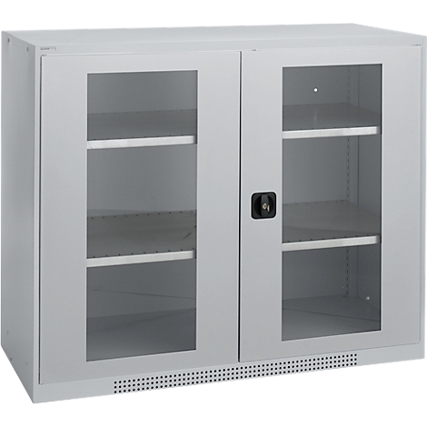 Grey rectangular cabinet with glass doors and shelves. Black handle, ventilation slots below the doors.