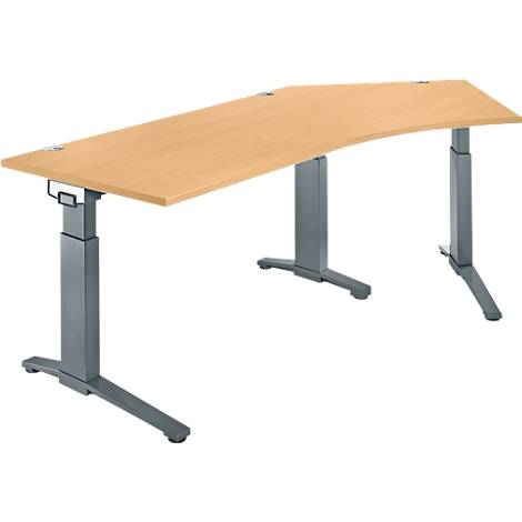 An ergonomic, height-adjustable desk with a light brown tabletop and gray metal legs.