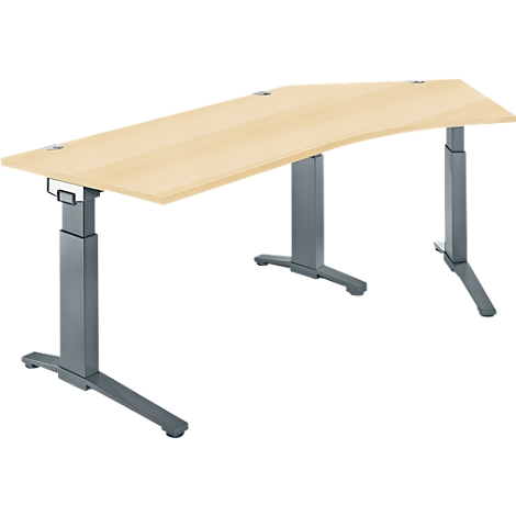 A light-colored, curved desk with gray-silver height-adjustable legs.