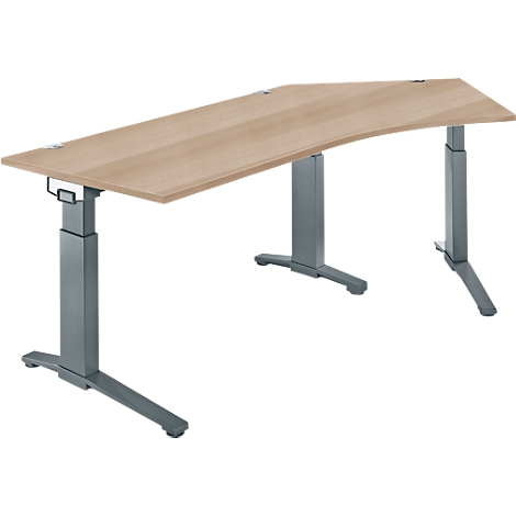 An adjustable-height desk with a light brown tabletop and gray legs against a white background.