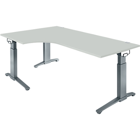 An L-shaped, height-adjustable desk in gray with a silver frame. The tabletop is light gray and rectangular.