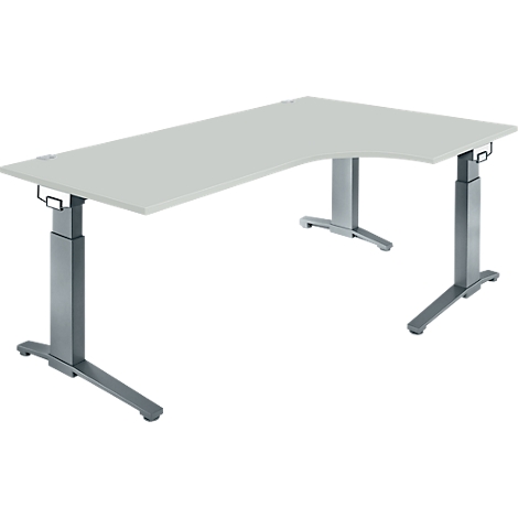 Light grey corner desk, height adjustable. Metal legs, rounded corner.