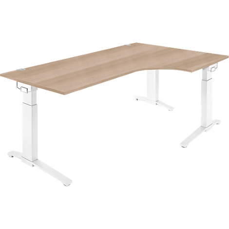 A light wood-colored corner desk with a white, height-adjustable frame. The tabletop is L-shaped.