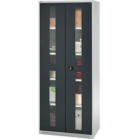 Cabinet with glass windows, filled with various objects.