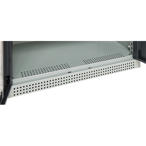 Close-up of a cabinet interior, gray metal plate with rows of holes.