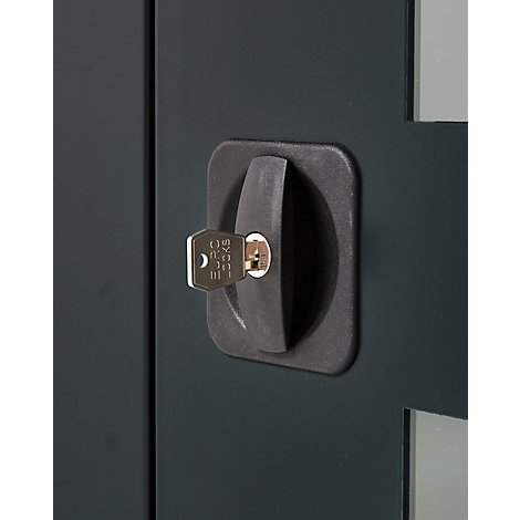Close-up of a black door handle with a key inserted. The handle is rectangular with rounded corners.