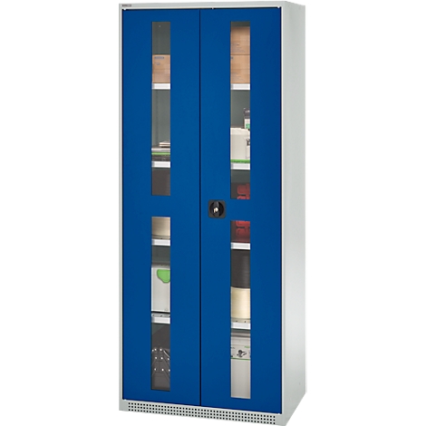 Blue cabinet with glass doors. Inside, shelves with various objects.