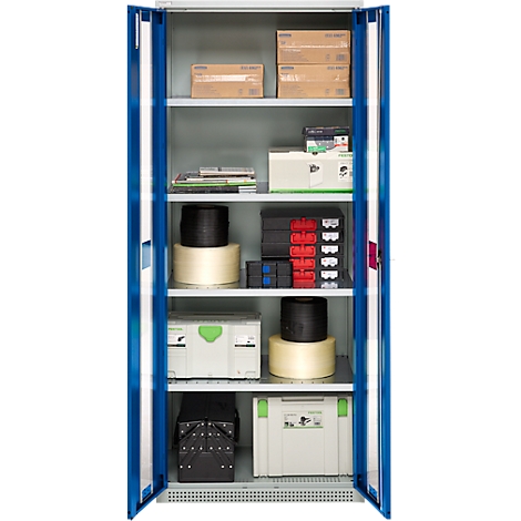 Open blue tool cabinet with various tools and materials, including boxes, spools of thread, and toolboxes.