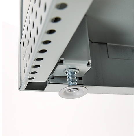 Close-up of a metal construction with an adjustable foot. The construction is grey and has holes. The foot is adjustable.
