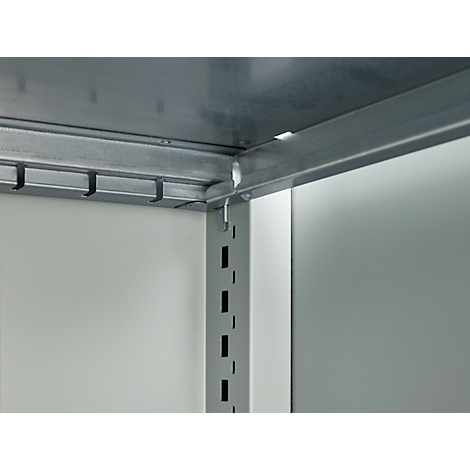 Close-up of a corner of a metal shelf, gray color, hooks for attachment.