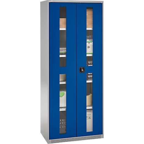 Blue cabinet with glass doors, filled with folders and materials.