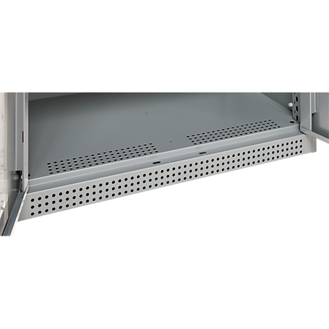 Close-up of a gray metal shelf in a cabinet, perforated with small holes.