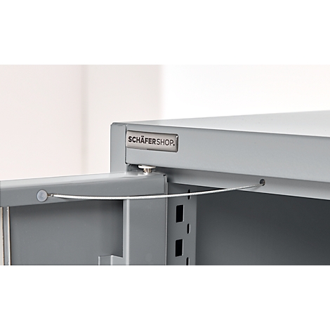 Detail of a gray cabinet with an open compartment. The "SCHÄFERSHOP" logo is visible at the top.