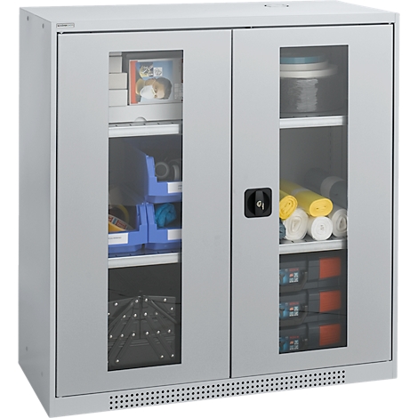 Grey cabinet with glass doors, filled with items.