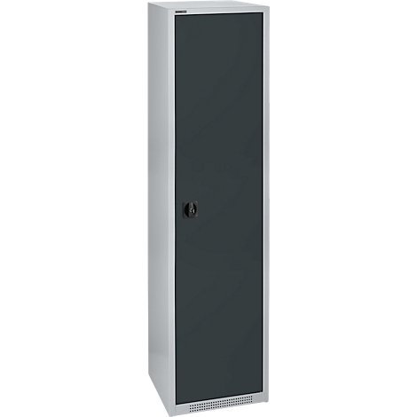 Grey cabinet with dark door. A black knob is in the middle of the door. Ventilation slots are at the bottom.