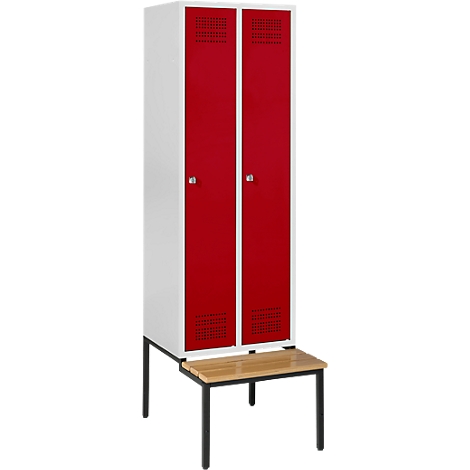 Locker with red doors, white frame, and a bench with black legs.