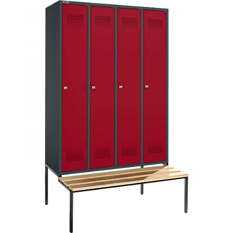 Red lockers with a hole pattern and gray frames. Below, a wooden bench with black legs.