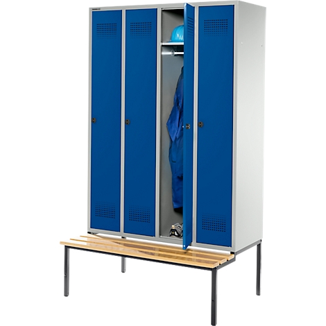 Steel locker with blue doors. One door open, showing clothes and a helmet. Wooden bench in front.