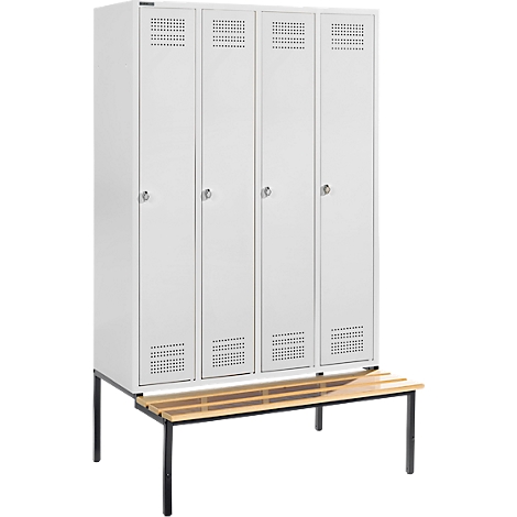White lockers with wooden bench. Four lockers with keys and ventilation slots.
