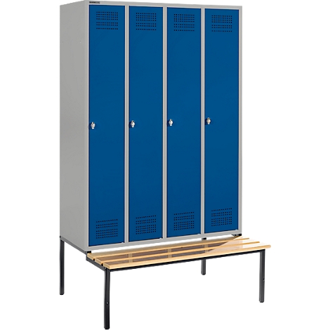 A blue locker with four doors and a wooden bench below.