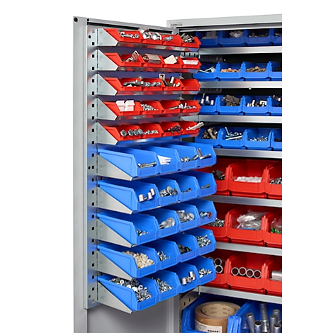 Werkzeugschrank mit roten und blauen Aufbewahrungsboxen, gefüllt mit Schrauben und Kleinteilen.