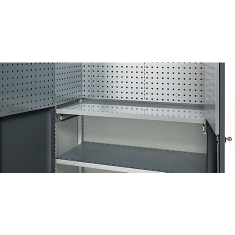 Interior view of a workshop cabinet with perforated back walls and shelves.