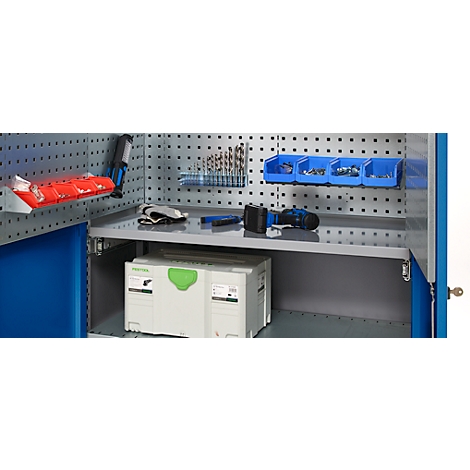 An open tool cabinet filled with tools and accessories. Drilling tools and blue containers are at the top. Tools are on the middle shelf.
