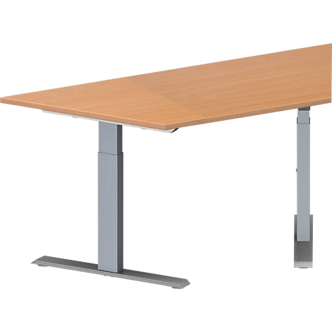 Un escritorio ajustable en altura con una mesa de color marrón claro y patas grises, sobre un fondo blanco.