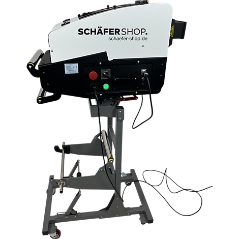 Verpakkingsmachine met "SCHÄFER SHOP" belettering, bedieningspaneel en rollen.